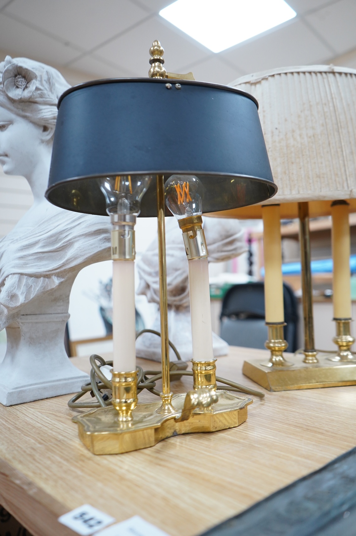 Two early 20th century French brass desk lamps, tallest 45cm